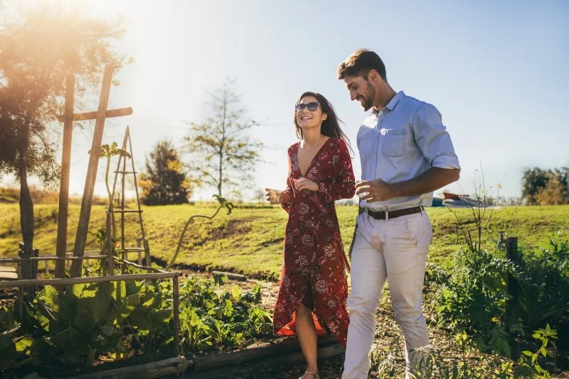 Couple walking together, demonstrating healthy communication and connection through therapy